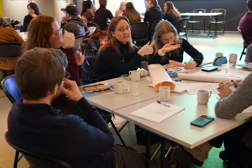 Group brainstorm with Tuva speaking.