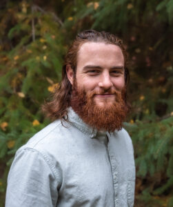Donovan Russoniello (he/him) is currently the Outreach Director for Renewable Energy Alaska Project - the leading clean energy education and advocacy group in the only Arctic state in the United States. Donovan earned a degree in Finance and Applied Mathematics from the University of Notre Dame, and after graduating in 2016 he spent three years honing his analytical skills as an economic consultant in Chicago. Since then, Donovan has utilized those skills to assist in developing and advocating for policies designed to accelerate Alaska's clean energy transition. He also has extensive experience managing Alaskan political campaigns and community organizing with organizations such as the Sunrise Movement, The Climate Reality Project, and the Fairbanks Climate Action Coalition. In 2021, Donovan's organizing and advocacy helped convince Alaska's Republican Governor to introduce Renewable Portfolio Standard legislation that would require the state's urban utilities to generate 80% of their electricity from renewable energy resources by 2040. Since joining REAP full time in 2022, Donovan has worked to further the organization's mission by developing and expanding its organizational membership, fundraising programs, and grant proposals along with managing REAP’s external communications and events. Donovan is passionate about building a broad movement of government agencies, private industry, technology providers, and other Alaskan energy stakeholders united by a common vision for our clean energy future and developing policies that will allow us to realize that shared vision. He is inspired by the example Norway has set as an oil-rich society that nonetheless generates the vast majority of its electricity from renewable resources while leading the charge toward electrified transportation solutions. Donovan hopes to draw lessons from the Norwegian success story to help inform Alaska's own Green Shift.