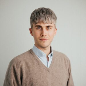 Thomas Baker works in the international office of Nordland County Council, where he serves as the Regional Contact Point for the Interreg Northern Periphery and Arctic programme. In this role, he provides advice and assistance on participation in transnational projects, supports project development and matchmaking, and promotes opportunities for Nordic and European cooperation. He has also worked as a European financing adviser for the Bodø2024 European Capital of Culture, where he managed international mobilities and secured funding for cultural projects.   Thomas is educated to master’s degree level in international relations and foreign policy, giving him a robust academic foundation to complement his work in Arctic and European cooperation.