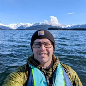 Matt Naylor is a Lieutenant in the U.S. Coast Guard. He spent six years in Alaska coordinating search and rescue and emergency response operations across the North Pacific Ocean, Gulf of Alaska, Bering Sea, and Arctic Ocean. He also managed responses to environmental pollution incidents and natural disasters in remote portions of Alaska to include glacial flooding events, weather-induced landslides, and sunken vessels. Matt is a 2017 graduate of the U.S. Coast Guard Academy where he earned a Bachelor’s degree in Marine Environmental Science, and he also holds a Master of Science in Environmental Policy and Management. He currently serves as an International Port Security Liaison working with foreign governments across Europe, Africa, and the Middle East to collaborate and share best practices for the improvement of commercial port security practices worldwide. Matt lives in the Netherlands with his wife of eight years and two daughters, both born in Alaska.